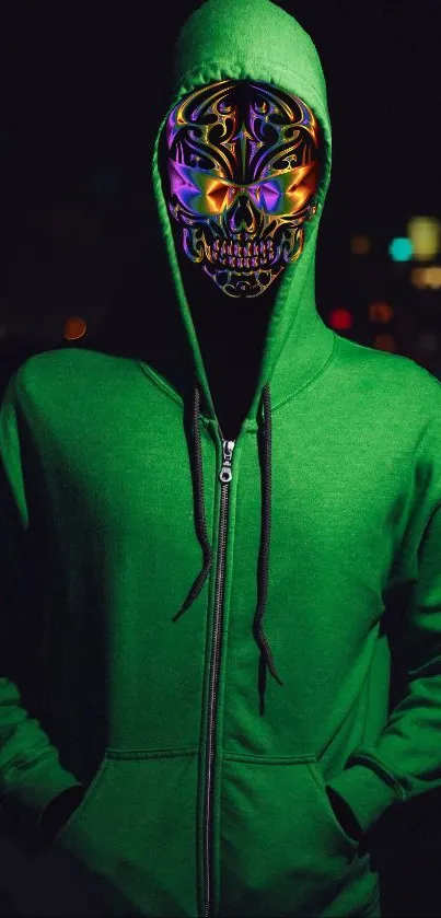 Green hoodie with colorful neon mask design on black background.