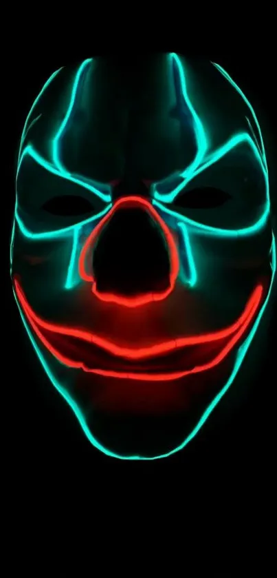 Neon mask with teal and red on black wallpaper.