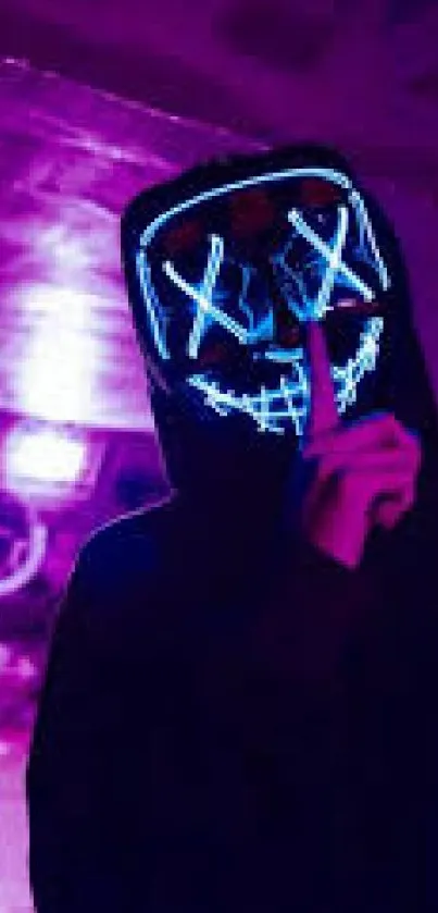 Mysterious figure wearing neon mask with purple background.