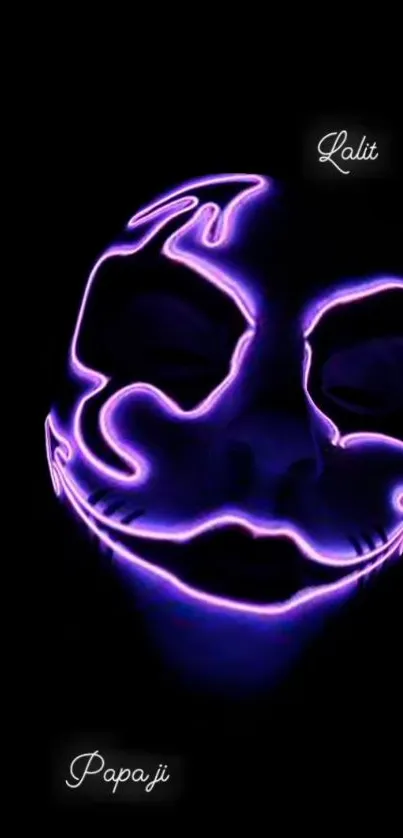 Neon mask glows on dark background wallpaper.