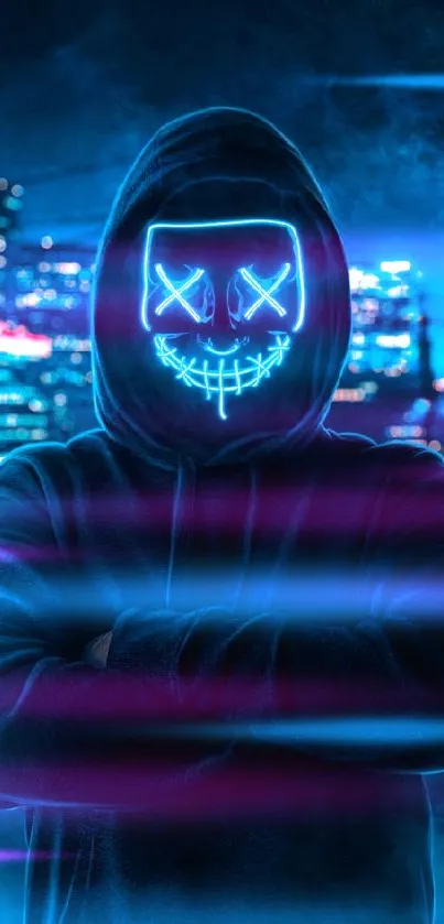 Hooded figure with neon mask in city background wallpaper.