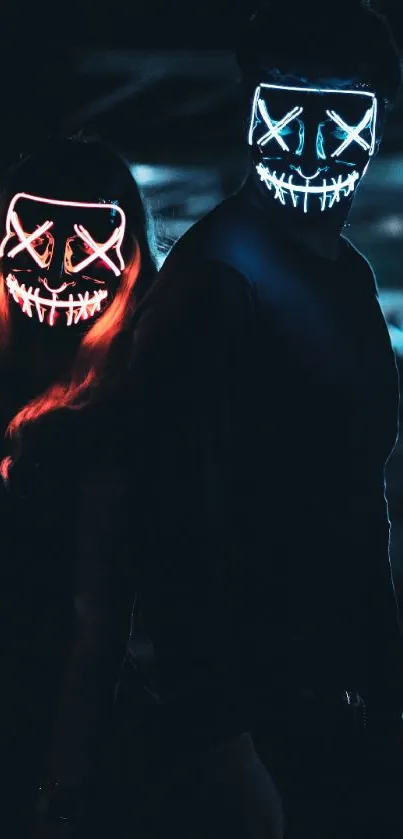 Two figures wearing neon-lit masks in a dark ambiance.