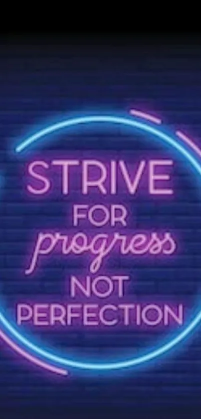 Neon sign with motivational quote in vibrant colors.