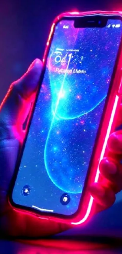Neon-lit phone with galaxy themed wallpaper.