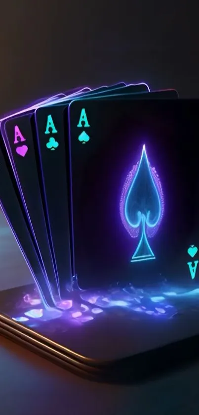 Neon glowing aces on a smartphone.