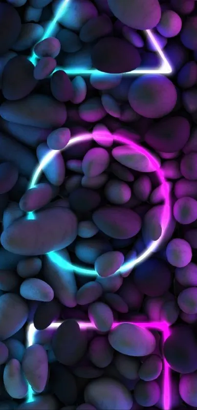 Neon geometric shapes on smooth pebbles background.