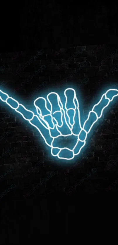 Neon skeleton hand gesture on dark background.