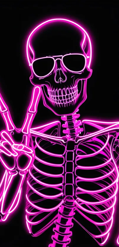 Neon pink skeleton showing peace sign in vibrant style.