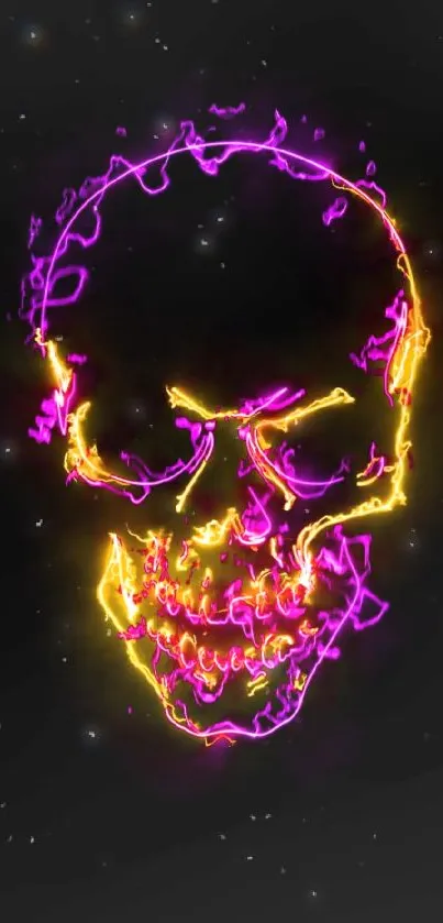 Neon yellow and pink skull on a black background.