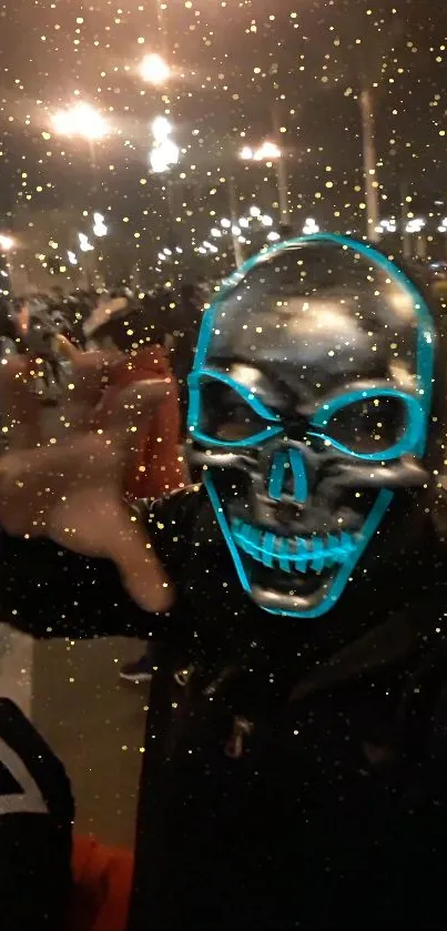 Neon skull mask with golden sparkles in nighttime urban setting.