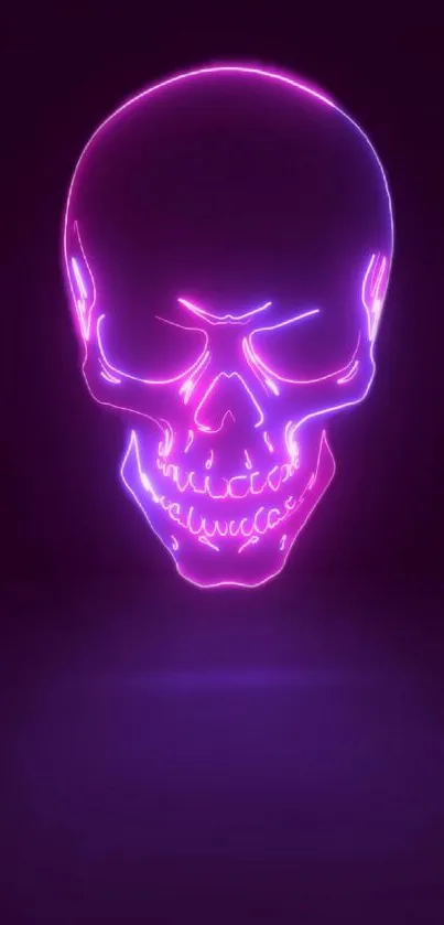 Neon skull in vibrant pink and purple hues on a dark background.