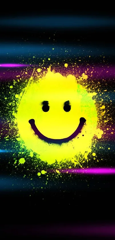 Vibrant neon smiley face with paint splatter on dark background.