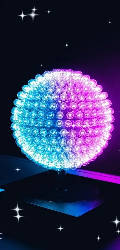 Neon sphere with blue and pink lights on a dark background.