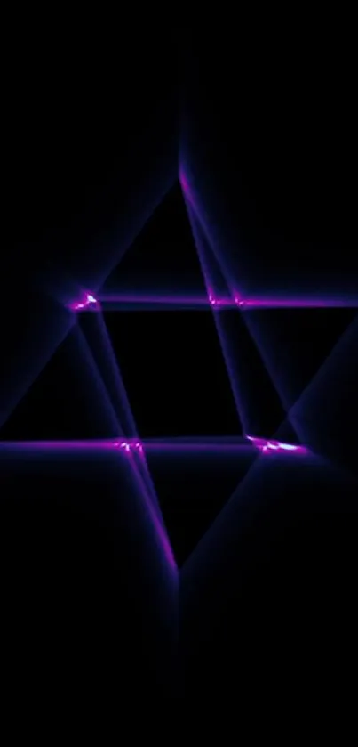 Neon star glowing with purple light against a dark background.