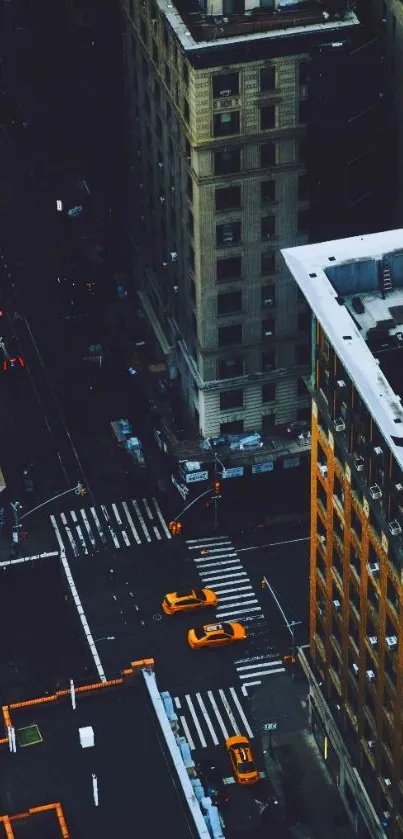 Aerial view of New York City with yellow taxis on streets.