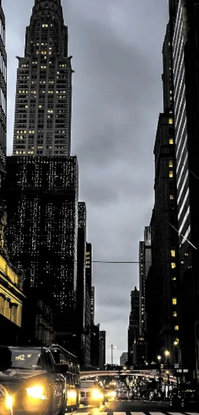 New York City nightscape with towering skyscrapers and streetlights.