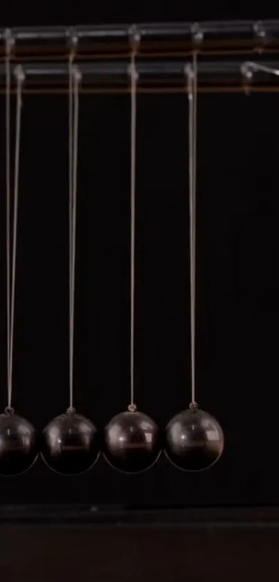 Newton's Cradle dark mobile wallpaper with physics theme.