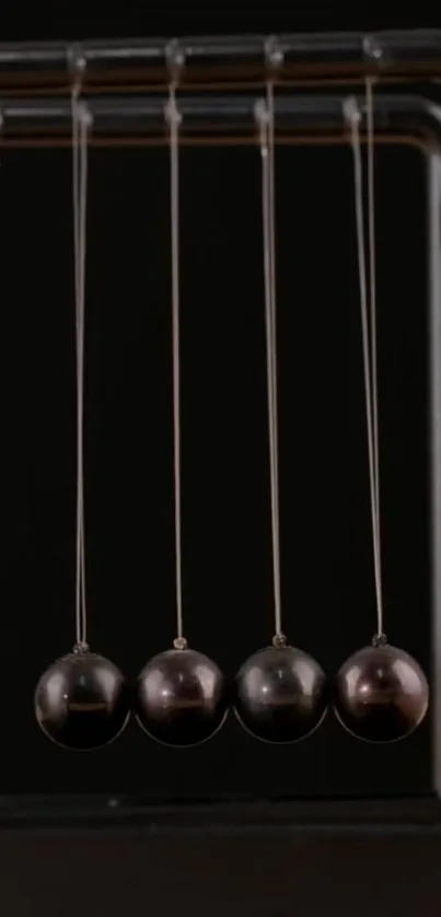 Newton's Cradle mobile wallpaper in motion, stylish and dynamic art.