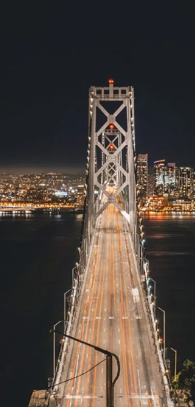 Stunning nighttime view of an illuminated bridge and cityscape.