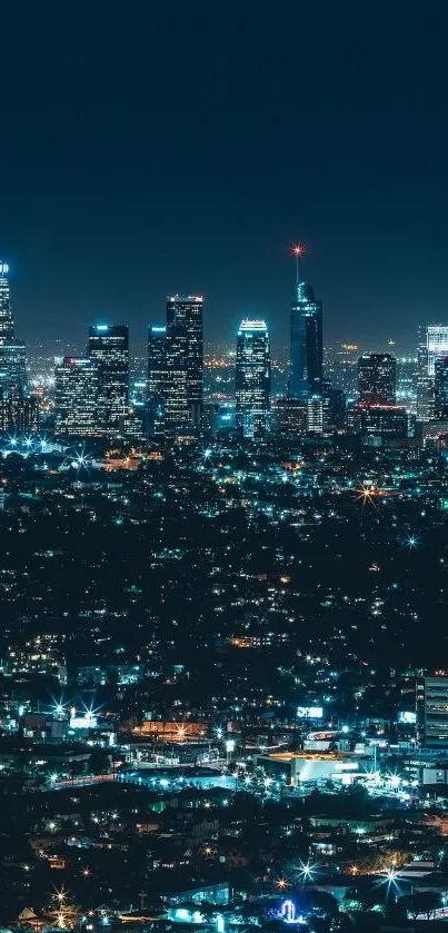 Stunning night city skyline with glowing lights and a tranquil dark blue sky.