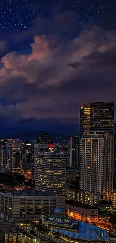 City skyline at night with stars above.