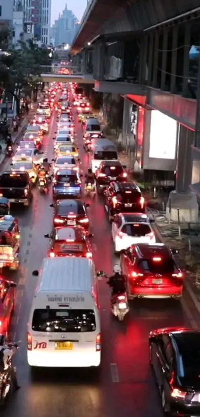 Evening city view with busy traffic and glowing lights.