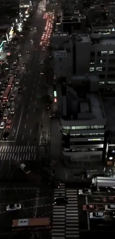 Nighttime cityscape with streetlights and buildings, perfect for mobile wallpaper.