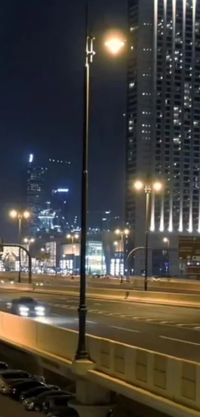 A vibrant cityscape at night with lit towers and streets in view.