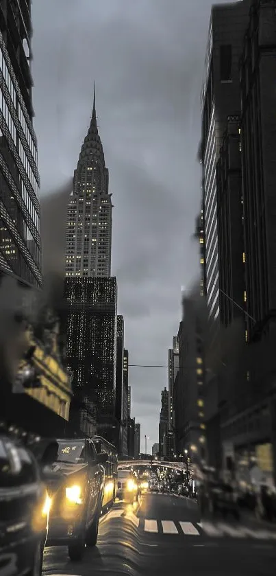 Evening city skyline with illuminated skyscrapers and streetlights.