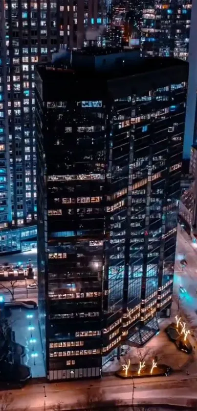 Night cityscape with illuminated skyscrapers in a vibrant urban setting.