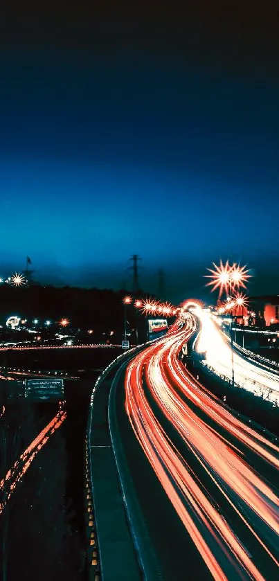 Night cityscape with light trails and prominent tower.