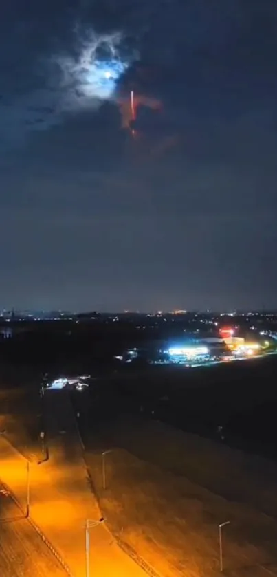 Night cityscape with moonlight and glowing urban lights.