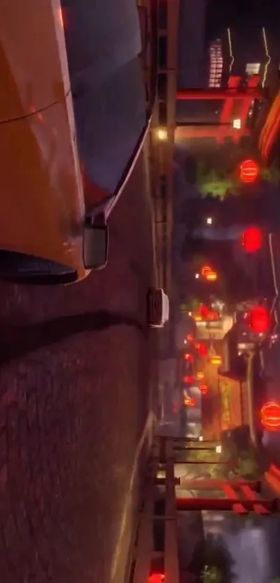 Neon-lit city street with cars at night.