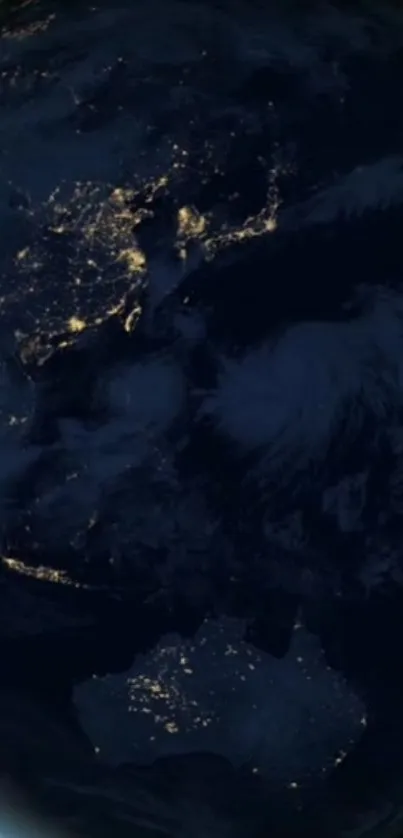 Earth viewed from space at night with city lights visible.