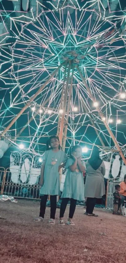 Children under a glowing Ferris wheel at night in a vibrant scene.