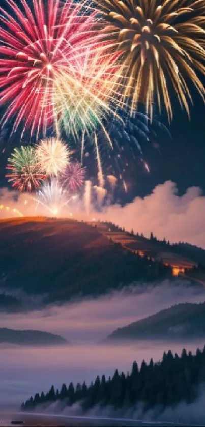 Fireworks illuminate a misty mountain landscape at night.