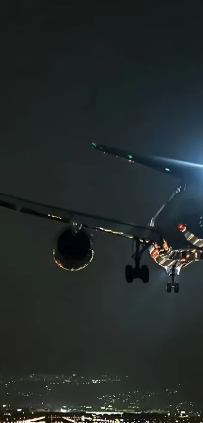 Plane landing at night with city lights in background.