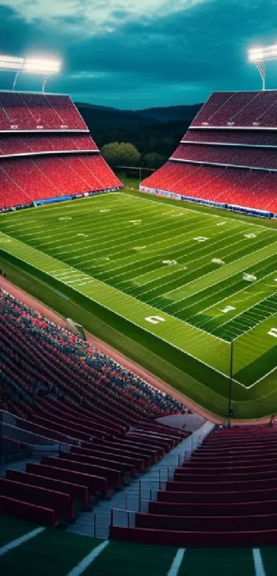 Night view of illuminated football stadium with green field.