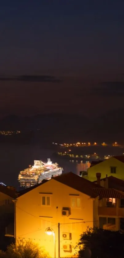 Serene night harbor cityscape with cruise ship and illuminated buildings.