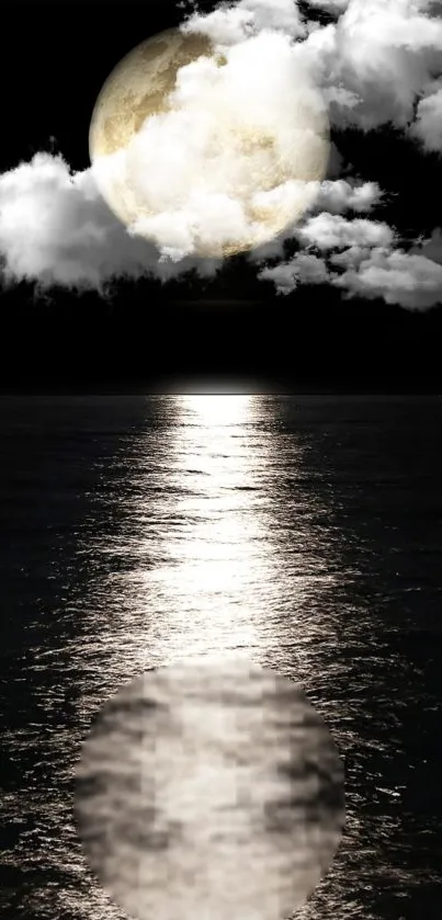 Full moon reflecting on calm water with clouds.