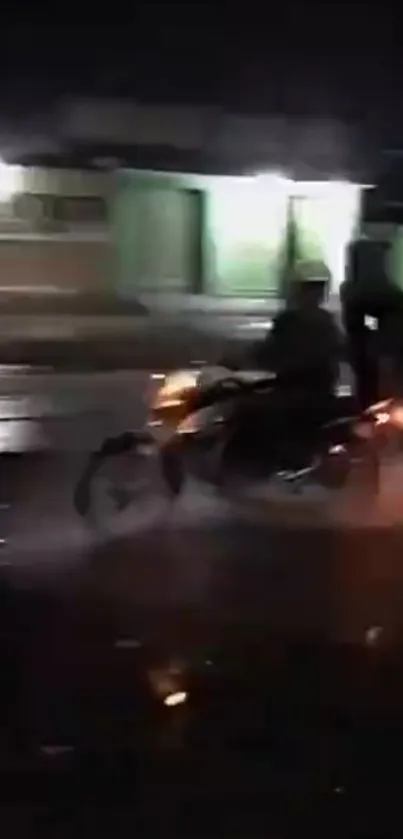 Dynamic nighttime motorcycle ride in urban setting.