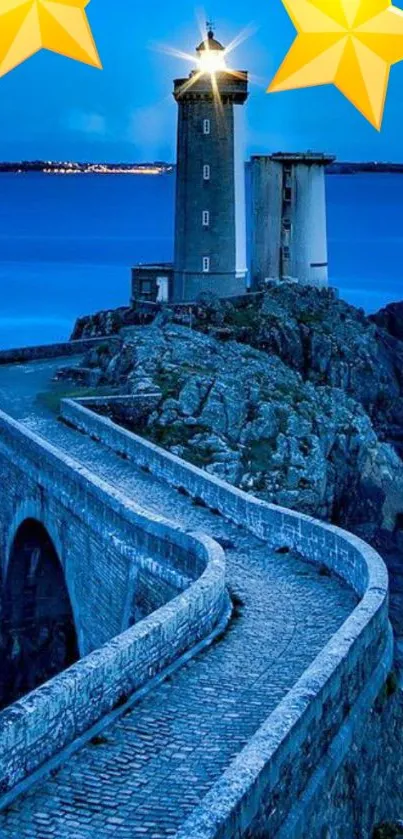 Night view of lighthouse with stars in serene blue tones.