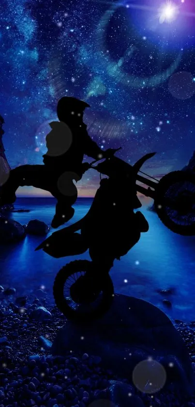 Silhouette of a motorbike against a starry night sky backdrop.