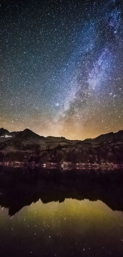 Starry night sky over mountains with reflection in water.