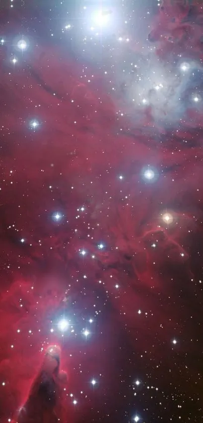 Vibrant red nebula with twinkling stars in night sky