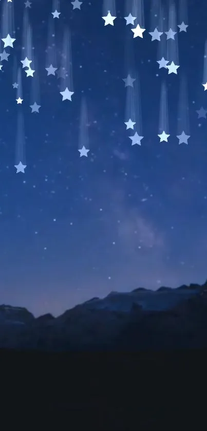 Starry night sky with mountain silhouette and twinkling stars.