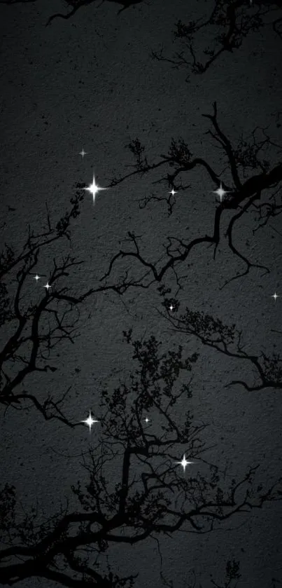 Dark branches and stars on a night sky wallpaper.