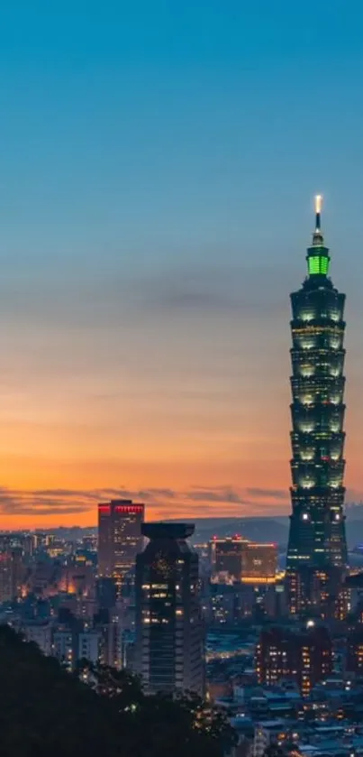 Taipei 101 tower at dusk against a sunset sky.