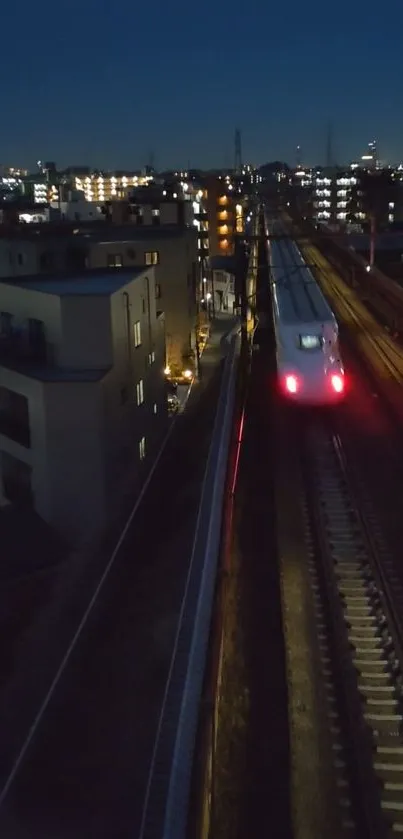 High-speed train racing through city at night.