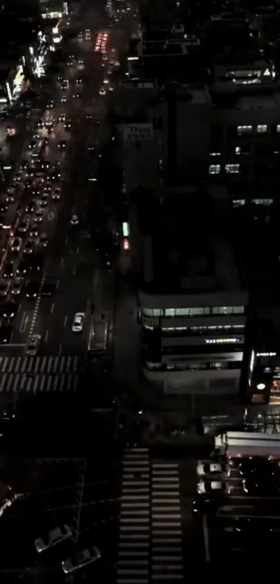 Nighttime urban street view with city lights.